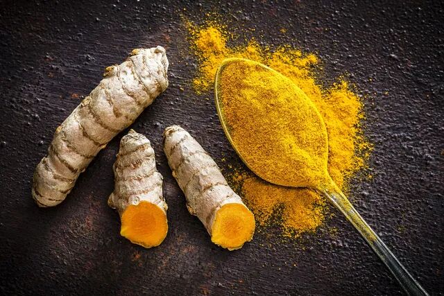 turmeric-roots-and-powder-shot-from-above-royalty-free-image-1588089678.jpg